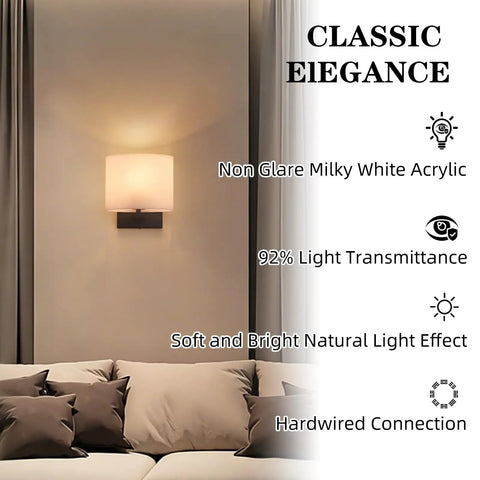 AuroraSpher Indoor Hardwired Modern Milky White Acrylic Black Wall Sconce illuminating a cozy living space.