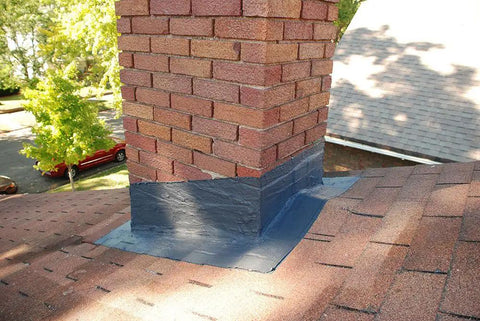 Installed Brushable Black Elastomeric Chimney Flashing Sealant for Waterproof Leak Protection Around Chimneys, Vents, and Skylights