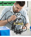 Man using Adjustable Soldering Third Hand Tool With Gooseneck Arms PCB Holder Three LED Magnifying Lamp 0 To 55mm Clamp Electronics Repair Stand