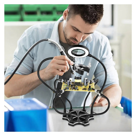Man using Adjustable Soldering Third Hand Tool With Gooseneck Arms PCB Holder Three LED Magnifying Lamp 0 To 55mm Clamp Electronics Repair Stand