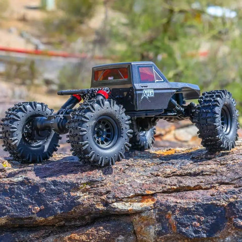 Ascent-18 Apex 1/18 Scale Brushless Rock Crawler With Carbon Fiber Chassis, 4WD on rocky terrain