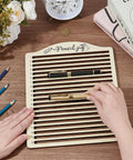 Person using 20 Slot Laser Engraving Jig For Pencils, Wood Pencil Fixture And Multi Pencil Clamping Tool for precise alignment on desk
