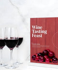 Clear Acrylic Sign Holder 4x6 Inches Three Pack T Shape Desktop Display Stand Double Sided Vertical Table Sign Holder For Restaurants Office Shop Wedding displaying a wine tasting event poster next to three red wine glasses.