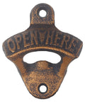 Antique Gold Cast Iron Wall Mounted Beer Bottle Opener With Rustic Hand Painted Finish Built For A Badass Backyard Bar Setup And Heavy Duty Outdoor Bottle Puller close-up view showing textured finish and 'OPEN HERE' engraving.