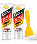 Front view of All In One Wall Repair Kit With Spackle Paste And Scraper Two Pack For Quick Dry White Plaster Patch Holes And Cracks Graffiti Easy DIY Fix For Home Projects Today, showing two tubes and a yellow scraper.