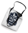 Dragon Boat Is Calling And I Must Go Tote Bag for paddlers and crew, 16x16, white with black cotton straps, angled view.