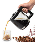 12 Cup Replacement Glass Carafe For FlexBrew Coffee Makers Fits Models 49980A 49980Z pouring coffee into glass with coffee beans