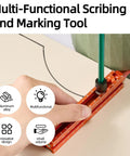 Four Sided Magnetic Layout Scriber With Laser Etched Scale For Straight On Measuring In Woodworking And DIY Carpentry Builds Lightweight Aluminum Alloy Knocks Out Perfect Lines Every Damn Time With Zero Sweat, showing precision marking on a surface.