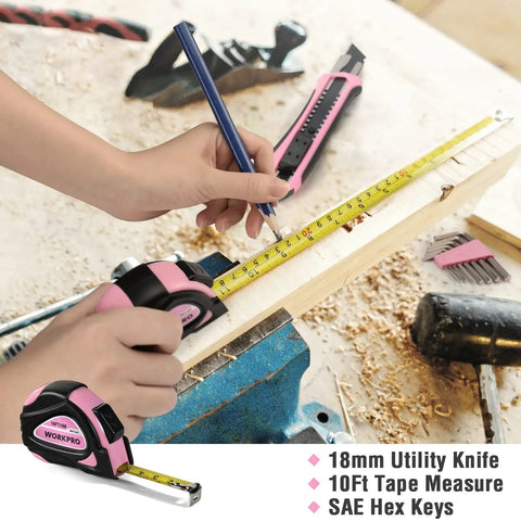Person using pink 10ft tape measure and utility knife from Pink 35 Piece Tools Set With Storage Toolbox For Home Garage Dorm And Apartment Essential Tool Kit For New House Projects And Back To School Prop 65 Safe Pink Ribbon Supports Helping Women Now on wooden plank.