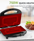 OSTBA 2 Slice Sandwich Maker Grill With Powerful 750W Non Stick Plates For Fast Even Toasting Crispy Wraps And Easy Clean Up Compact Kitchen Appliance with open lid.