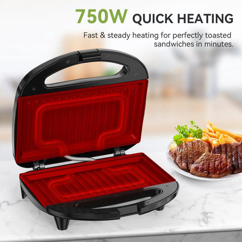 OSTBA 2 Slice Sandwich Maker Grill With Powerful 750W Non Stick Plates For Fast Even Toasting Crispy Wraps And Easy Clean Up Compact Kitchen Appliance with open lid.