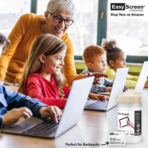 Children using laptops with a canister of All Purpose Screen Cleaning Wipes For Laptops Monitors Phones Tablets And TVs Fast Dry No Residue Anti Fog Anti Streak Seventy Percent IPA Formula Seventy Wipes Per Canister Large Nine By Six Inch Wipes Made In The United States in foreground