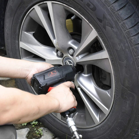 Heavy Duty Half Inch Pneumatic Impact Wrench With Twin Hammer For Auto Repair And Tire Shops, 1200 Ft Lbs Max Torque, 7000 RPM in use