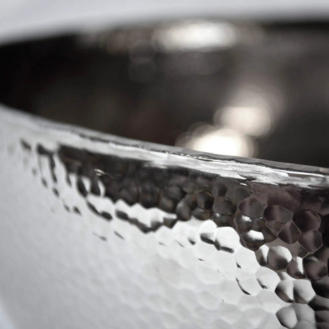Close-up of the Knockout Round Vessel Bathroom Sink 15 Gauge Hand Hammered Copper Polished Nickel Finish showing textured surface.