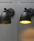 Industrial Hardwire Wall Sconce with Old School Farmhouse Vibe in Black, On and Off View, Right Angled Rustic Metal Lampshade