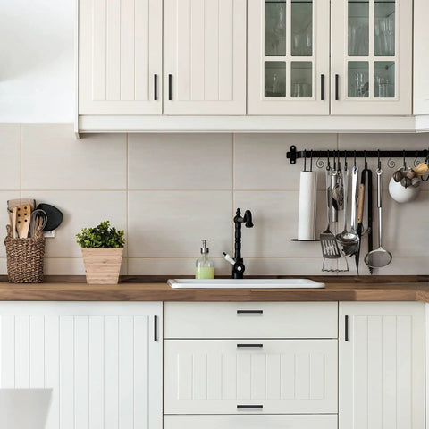 White kitchen cabinets with Slick Matte Black Square Bar Cabinet Handles 4 Inch Hole Center Pulls for kitchen cabinets and drawers.
