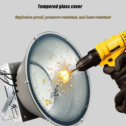 Tempered glass cover of 400W LED Construction Site Light, 6000K White Light Outdoor Flood Light, showing sparks during drilling.