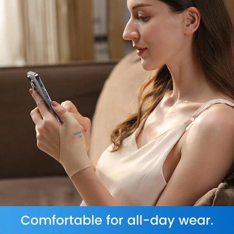 Elastic Thumb And Wrist Support Brace Pack Of 2 Splashproof Compression Sleeve worn by woman using phone, khaki small