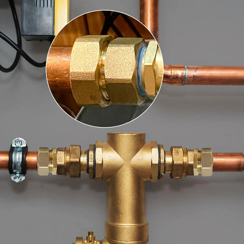 Real Solid 3/4 Inch Brass Pipe Union Fittings Three Pack Copper To Male Thread Sweat Plumbing Connectors installed on copper pipes.