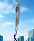 Massive 61ft Silver Soft Parafoil Beltfish Kite With Reel floating above city skyline, sea monster design visible.
