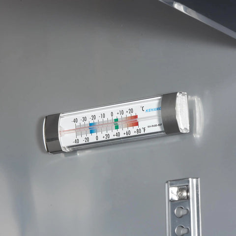 Thermometer mounted inside 54 Inch Heavy Duty Commercial Freezer 49 Cubic Feet Reach In Upright Cooler for temperature monitoring.