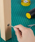 Inserting pin into wood using Spring Hinge Tension Pin Replacement Kit With 40 Stainless Steel Shelf Pins And 2 Hex Wrenches
