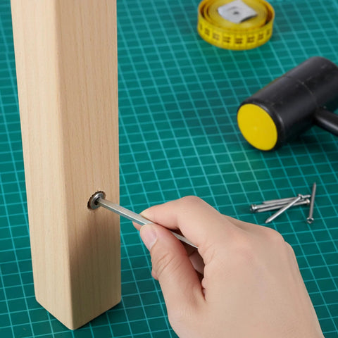 Inserting pin into wood using Spring Hinge Tension Pin Replacement Kit With 40 Stainless Steel Shelf Pins And 2 Hex Wrenches