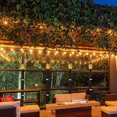 Outdoor patio with solar torch flame lamps using Solar Torch Flame Lamp Extension Kit With Joint Connectors 6 Pack, 12 Inch Extensions for Taller Flames.