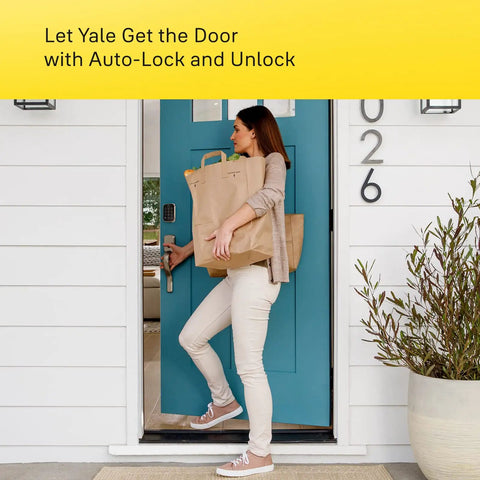Rock Solid Smart Deadbolt With Wireless Wifi And Touchscreen Keypad For Hassle Free Keyless Entry Tight Auto Lock Security And Sleek Passage Lever Handle In Satin Nickel Pack Of Three, woman entering home with bags.