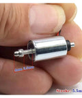 Mini Round 10mm Solenoid Electromagnet With 7.4V 9V 12V DC, Suction Push Pull Type held between fingers, showing 5.5mm stroke