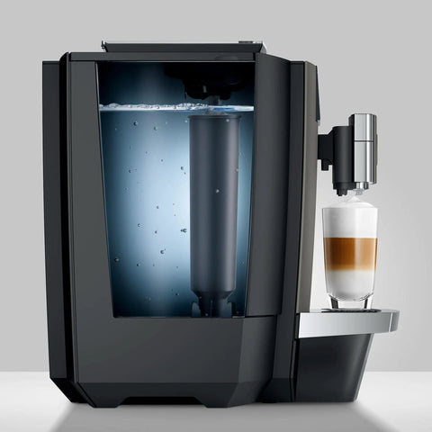 Premium Top Shelf Fully Automatic Coffee Machine Featuring Cold Brew Options And Thirty Four Recipes With Smart Touchscreen, with water and espresso in glass.