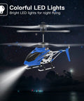 SYMA S107H Mini RC Helicopter with gyro and altitude hold showing LED lights in night sky, blue color.