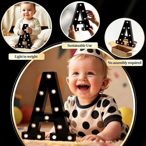 Lit Black Alphabet Marquee Letters Sign With Led Lights, Night Light For Home Bar And Party Decor held by smiling baby