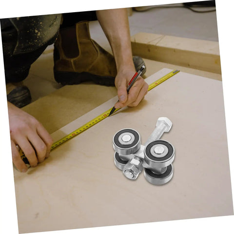Heavy Duty Double Bearing Sliding Door Pulley Kit Built Tough To Roll Like Butter On Any Barn Door Track or Closet Setup With Premium Stainless Steel Caster Wheels on workbench with measuring tape.