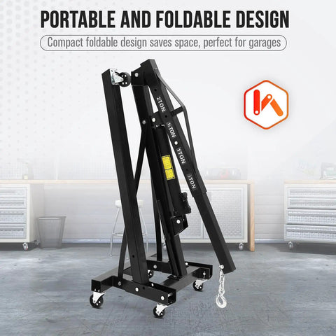 Badass Folding Hydraulic Engine Hoist With Telescopic Boom That Cracks Up To 4400 Pounds Rolling On Six Smooth Casters For Garage Cherry Picker Weekend Setup in portable folded position.