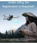 Mini 4 Pro Drone Fly More Bundle With RC 2 Controller With Screen Folding 4K Video Under 249g flying outdoors with user.