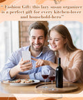 Happy couple using smartphone at table with Rock Solid 20 Inch Wood Lazy Susan For Kitchen Counter Slick Acacia Turntable Serving Tray.