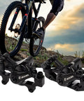 Rock Solid Mountain Bike Mechanical Disc Brake Set With Aluminum Alloy Calipers shown on rocky terrain with cyclist.
