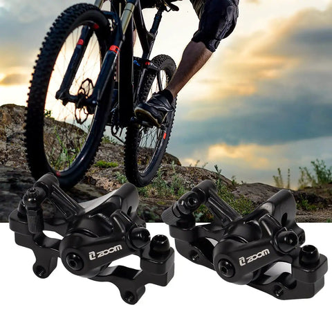 Rock Solid Mountain Bike Mechanical Disc Brake Set With Aluminum Alloy Calipers shown on rocky terrain with cyclist.
