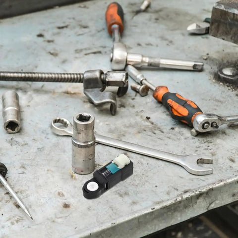 Gearhead Grade Transmission Shifter Adjuster Cable Head CV617C445AA For Maximum Power And Smooth Shifts Built From High Strength Alloy And Wear Resistant Polymer Lab Tested Thermal And Mechanical Toughness Keeps Cable Tension In Check on workbench
