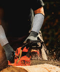 Solid Cut Resistant Forearm Sleeves With A Grippy Nonslip Fit And Thick Reinforced Seaming Built To Dodge Splinters And Scratches On Rough Worksites Or Weekend Garden Projects Reliable Armor That Stays Locked In Wherever You Hustle during chainsaw use.