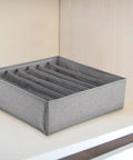 Multi Pocket Cloth Drawer Organizer For Bras Socks Ties And Briefs with multiple compartments in grey fabric.
