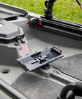 TracPak Quick Release Mounting Base for Track Mount Storage Boxes installed on a kayak, features micro adjustment slots and T-bolt hardware.