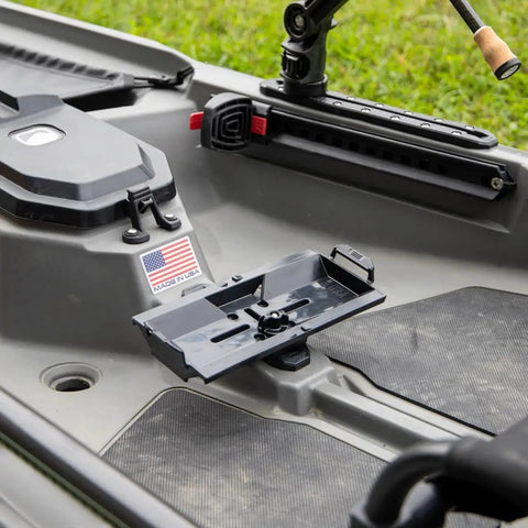 TracPak Quick Release Mounting Base for Track Mount Storage Boxes installed on a kayak, features micro adjustment slots and T-bolt hardware.