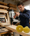 Heavy Duty Replacement Head Valve For Pneumatic Nailers Featuring Tough As Nails Construction And Precision Tuning To Deliver Smooth Operator Performance Every Time On All Major Framing Models. Worker using pneumatic nailer on wood beam.