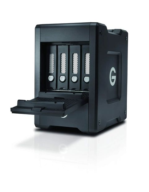 Top Shelf 16Tb Thunderbolt Portable Solid State Drive Raid Array Featuring Ev Bay Adapter and Knockout showing open drive slot.