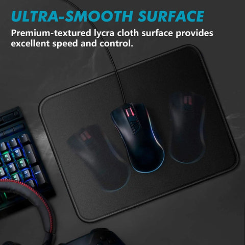 11 X 8.7 Inch Mouse Pad With Stitched Edges And Non Slip Base shown on desk with computer mouse on top.