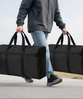 Person carrying Extra Large Moving Bags With Strong Zippers And Carrying Handles, Heavy Duty Duffle Storage Bags For Moving, Storage, Travel And Camping