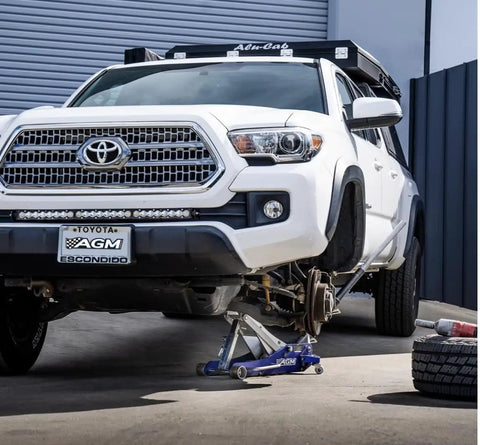 Locking Floor Jack Bar For 3.5 Ton Vehicles, 14 Inch Travel, Lightweight 3 Pound Stand Alternative shown lifting SUV
