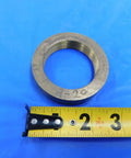 Top Shelf 2 Inch 20 Thread Brass Ring Gauge Nut Spacer For Precision Calibration And Machine Shop Work Built Sick Tight With Smooth Finishes For Heavy Duty Tasks Real Deal Engineering MH3938LVR with ruler on blue background.